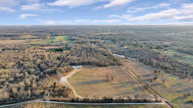 birds eye view of property with a rural view