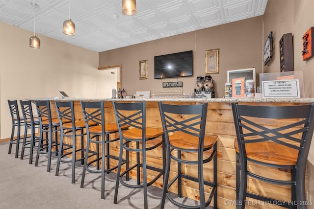 bar with decorative light fixtures