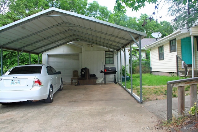 view of parking / parking lot with a garage and a carport