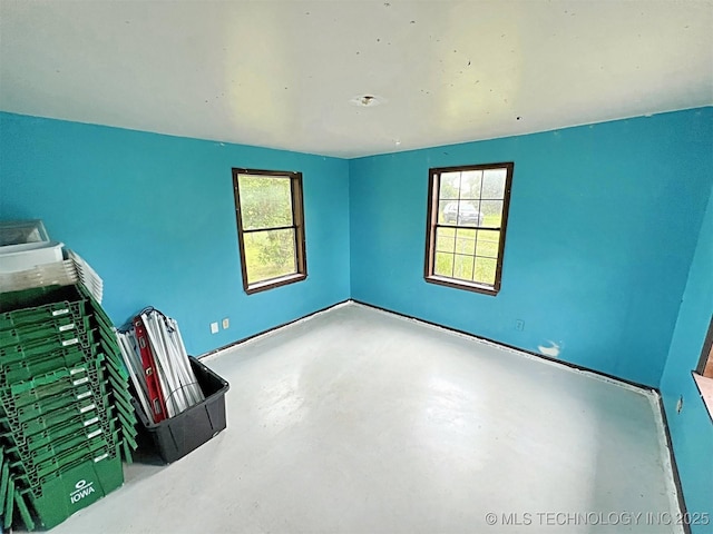 empty room with concrete floors