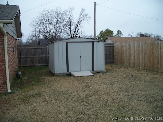 view of outbuilding featuring a yard