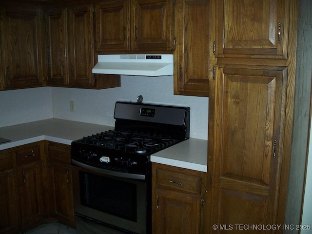 kitchen featuring stainless steel range with gas cooktop