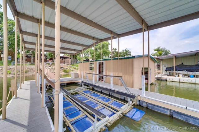 dock area featuring a water view