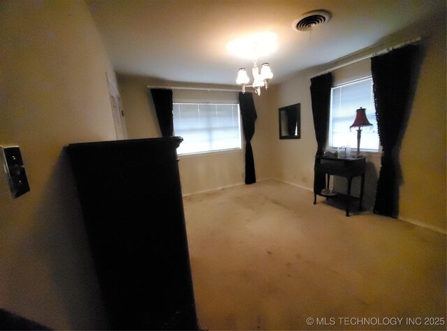 interior space with an inviting chandelier