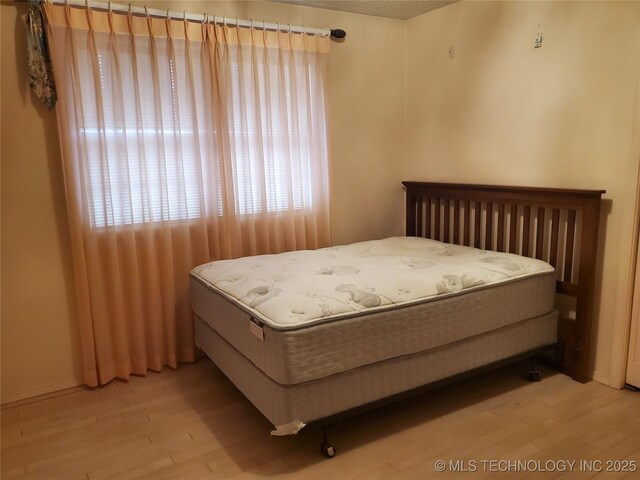 bedroom featuring light hardwood / wood-style floors