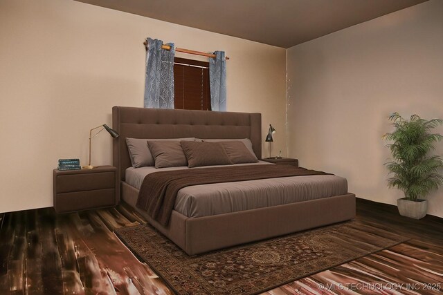 bedroom with wood finished floors