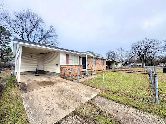 ranch-style home with a front lawn and a carport