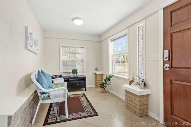 sitting room with light tile patterned flooring