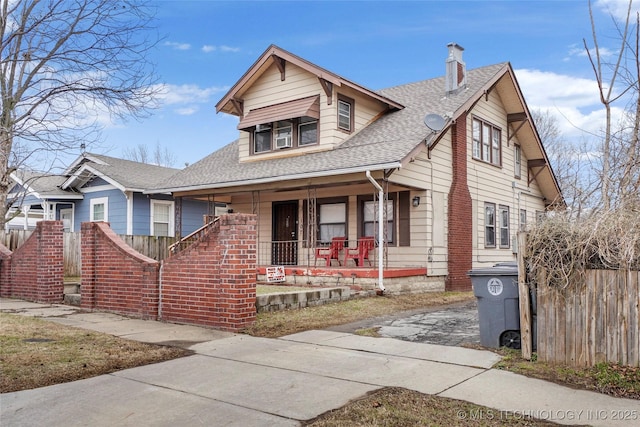 bungalow-style home featuring covered porch