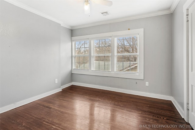 spare room featuring crown molding, ceiling fan, and dark hardwood / wood-style flooring