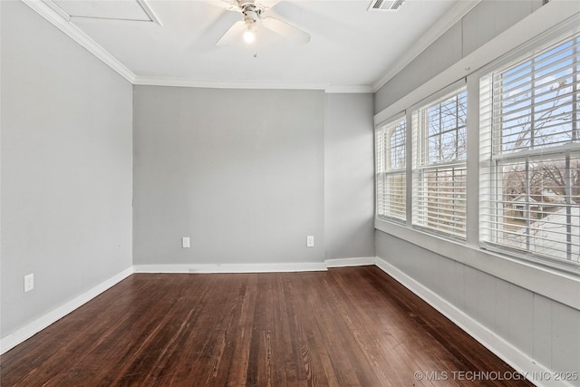 unfurnished room with crown molding, ceiling fan, and dark hardwood / wood-style flooring