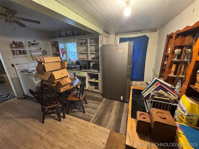 interior space featuring ceiling fan, wood-type flooring, washer / clothes dryer, and wooden ceiling