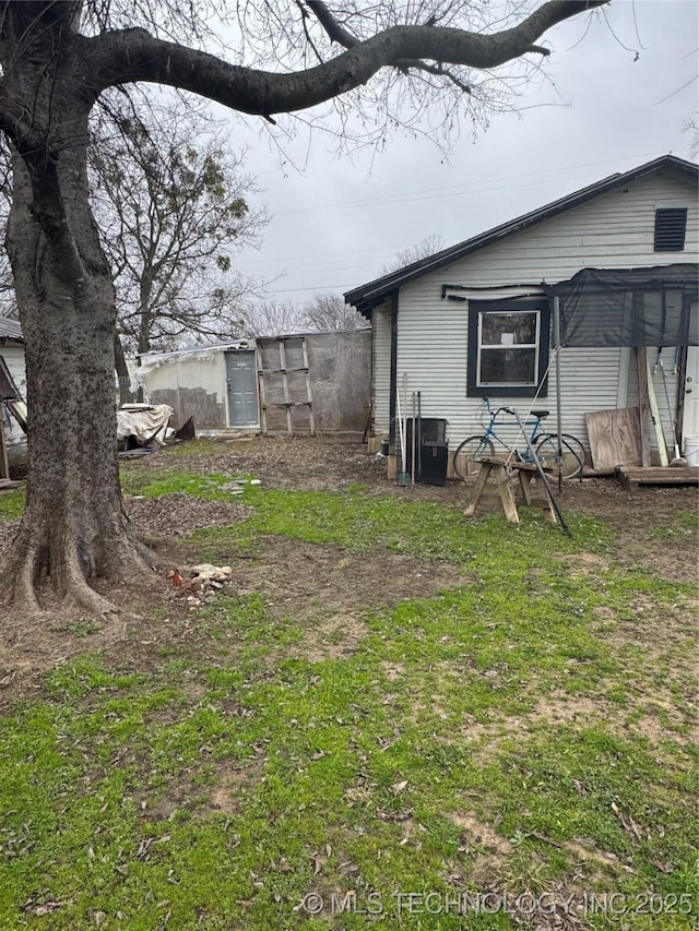 view of yard featuring central AC