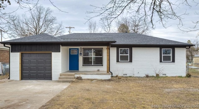 single story home featuring a garage