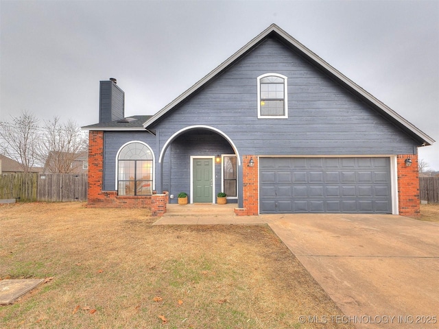 view of front facade featuring a garage, brick siding, fence, concrete driveway, and a chimney