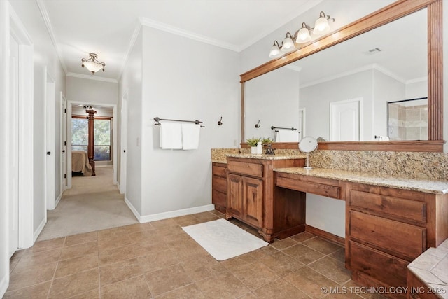 ensuite bathroom with vanity, baseboards, visible vents, and ornamental molding