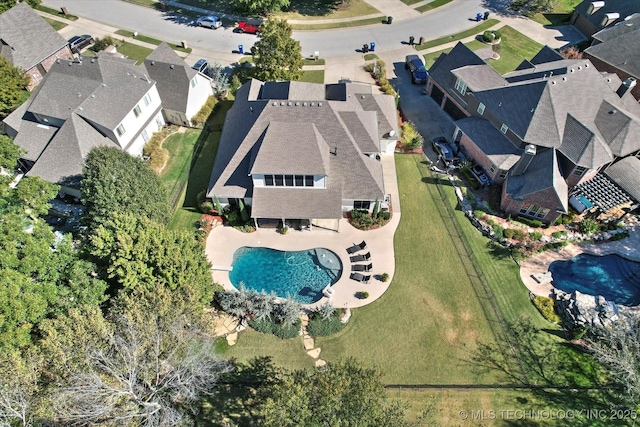 drone / aerial view featuring a residential view