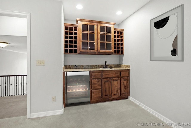8117 E Freeport St, Broken Arrow, OK 74014 - indoor wet bar with wine cooler, light colored carpet, baseboards, and recessed lighting