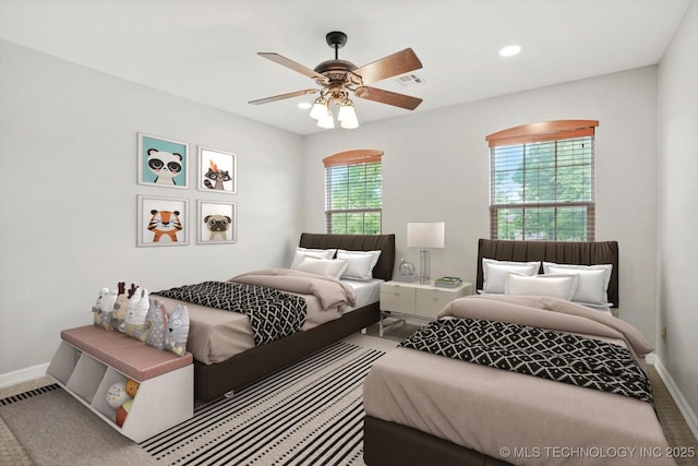8117 E Freeport St, Broken Arrow, OK 74014 - bedroom with carpet flooring, baseboards, a ceiling fan, and recessed lighting