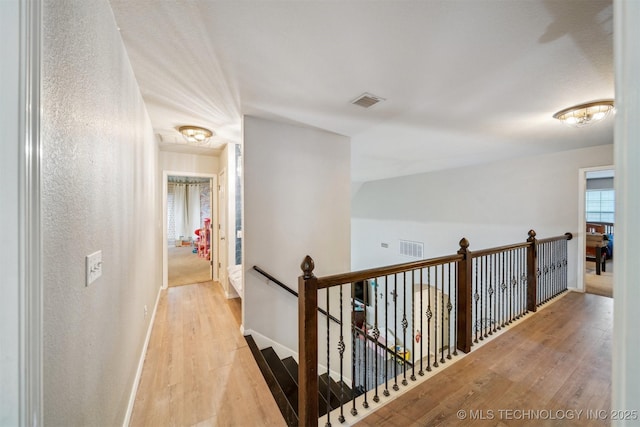 hallway featuring light wood-type flooring