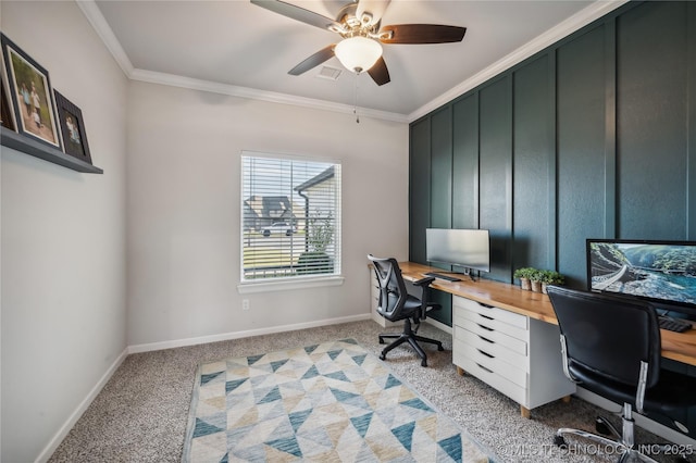 office space with ornamental molding, light carpet, and ceiling fan