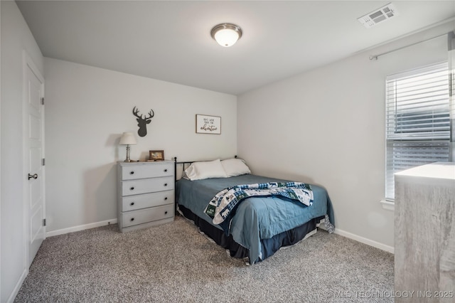 bedroom featuring light carpet