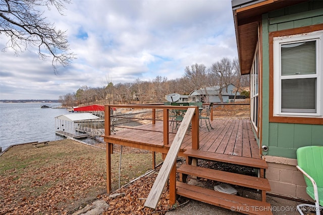 deck featuring a water view