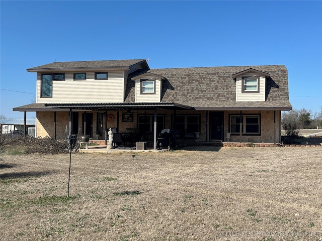 view of front of property featuring a patio area