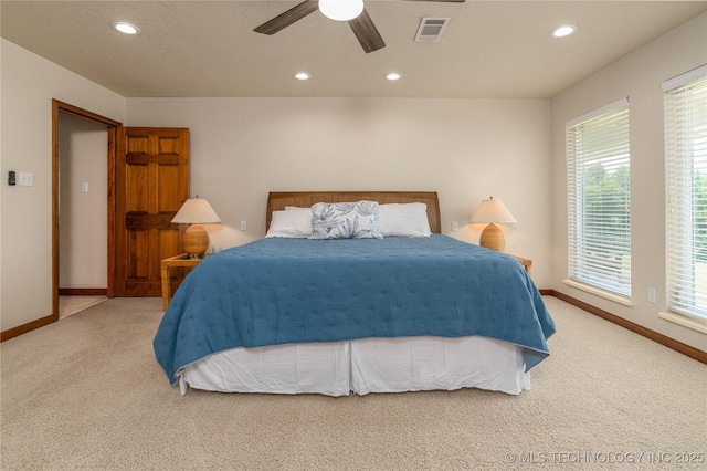 8775 Leonard St, Kingston, OK 73439 - carpeted bedroom featuring a textured ceiling and ceiling fan