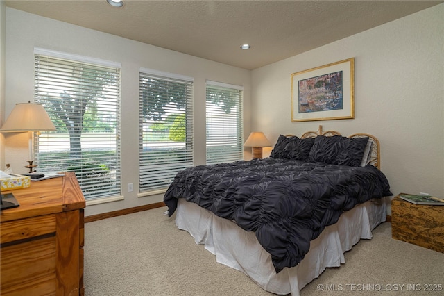8775 Leonard St, Kingston, OK 73439 - carpeted bedroom featuring a textured ceiling