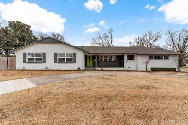 ranch-style house with a front yard