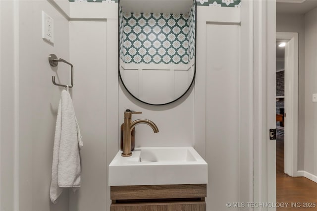 bathroom featuring vanity and hardwood / wood-style flooring