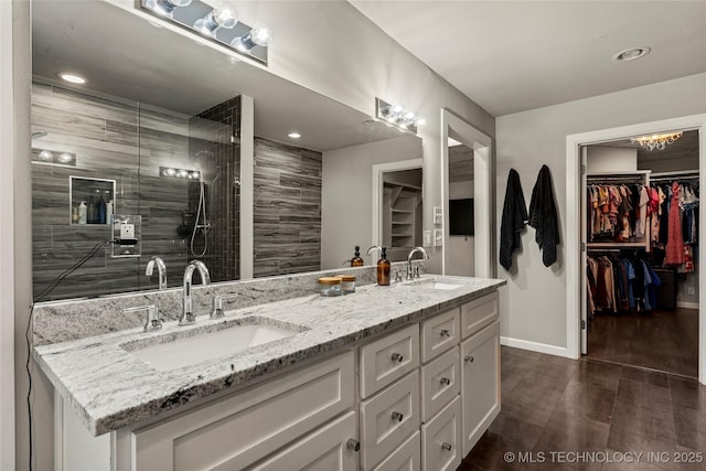 bathroom featuring vanity and wood-type flooring