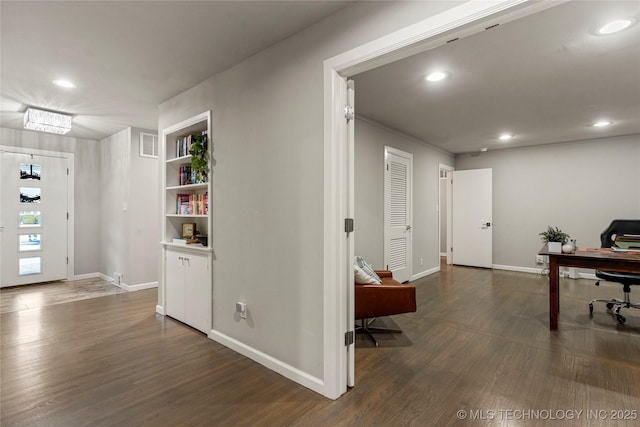 office space with dark wood-type flooring