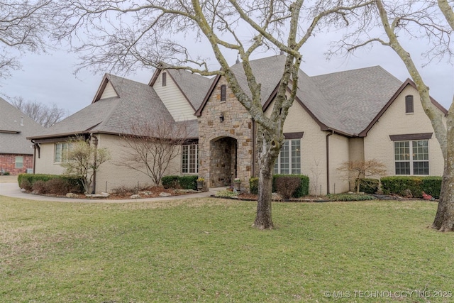 view of front of property with a front lawn