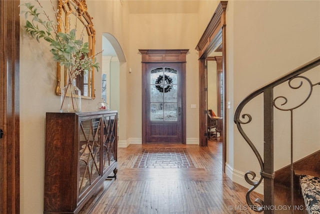 foyer entrance with hardwood / wood-style flooring