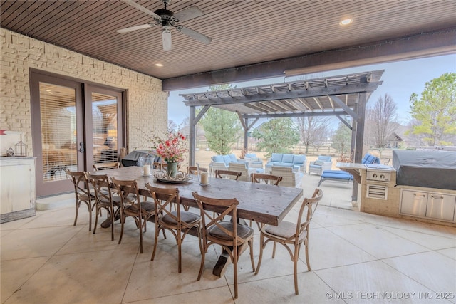 view of patio / terrace with exterior kitchen, area for grilling, an outdoor living space, and a pergola