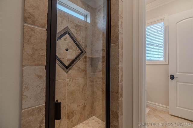 interior space featuring an enclosed shower, tile patterned flooring, and a healthy amount of sunlight