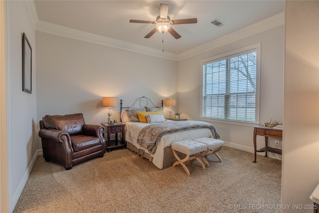 carpeted bedroom featuring ceiling fan and ornamental molding