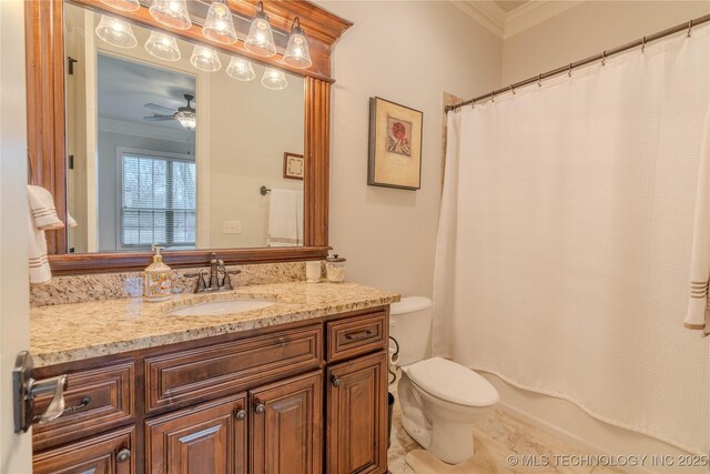 bathroom featuring ceiling fan, ornamental molding, toilet, and vanity