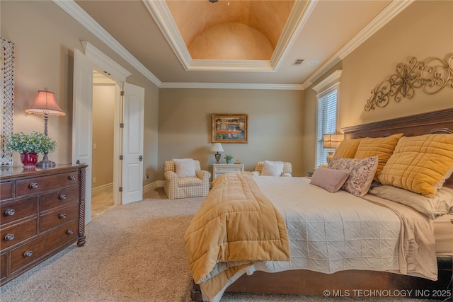 carpeted bedroom featuring ornamental molding and a raised ceiling