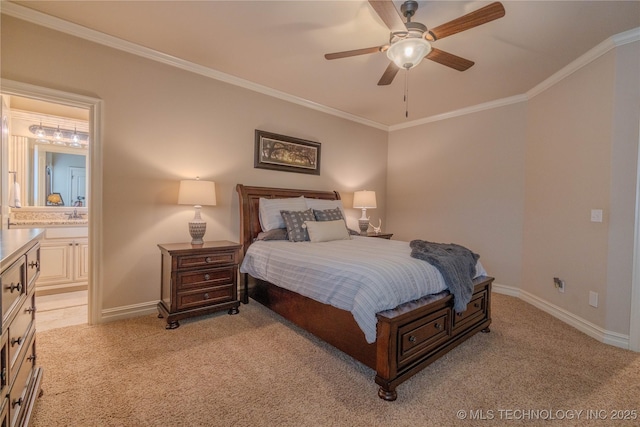 carpeted bedroom featuring ornamental molding, ensuite bathroom, and ceiling fan