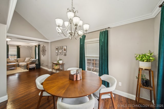 dining space with dark wood-type flooring, ornamental molding, vaulted ceiling, and a notable chandelier