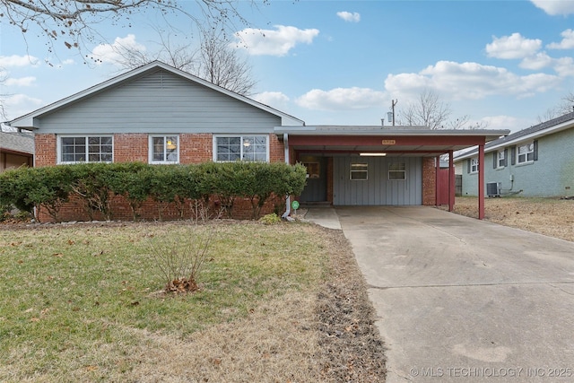 single story home with a carport, cooling unit, and a front lawn