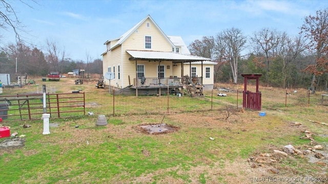 view of front of home with covered porch and a front yard