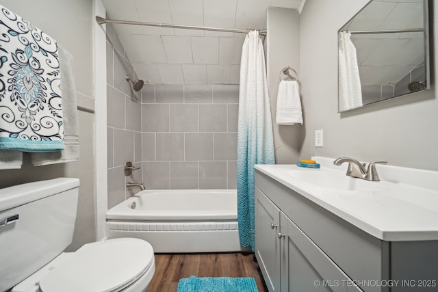 full bathroom featuring hardwood / wood-style flooring, vanity, toilet, and shower / bath combo