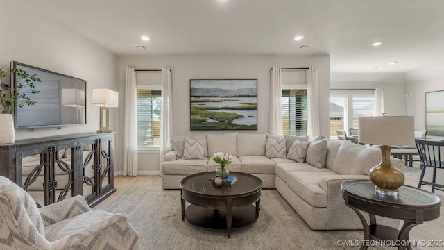 living room with light hardwood / wood-style flooring