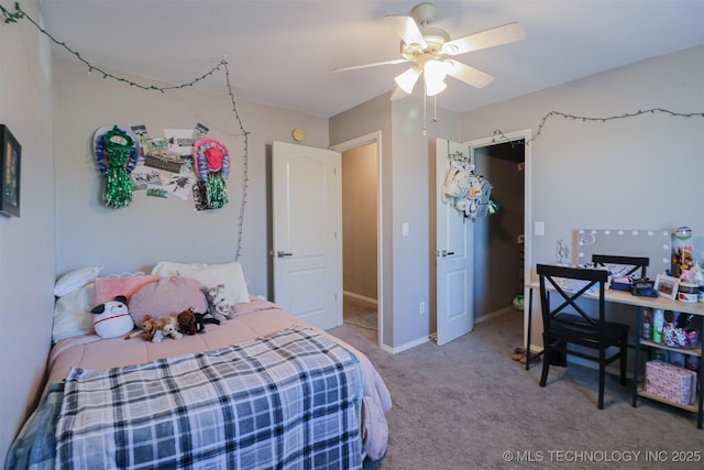 bedroom with ceiling fan and carpet