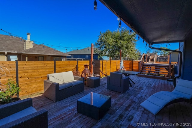 deck with outdoor lounge area