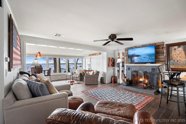 living room featuring ceiling fan and dark hardwood / wood-style flooring